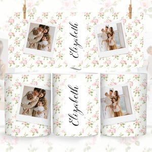 May include: Two white mugs with a floral pattern and a photo of a family. The mugs are personalized with the name "Elizabeth".