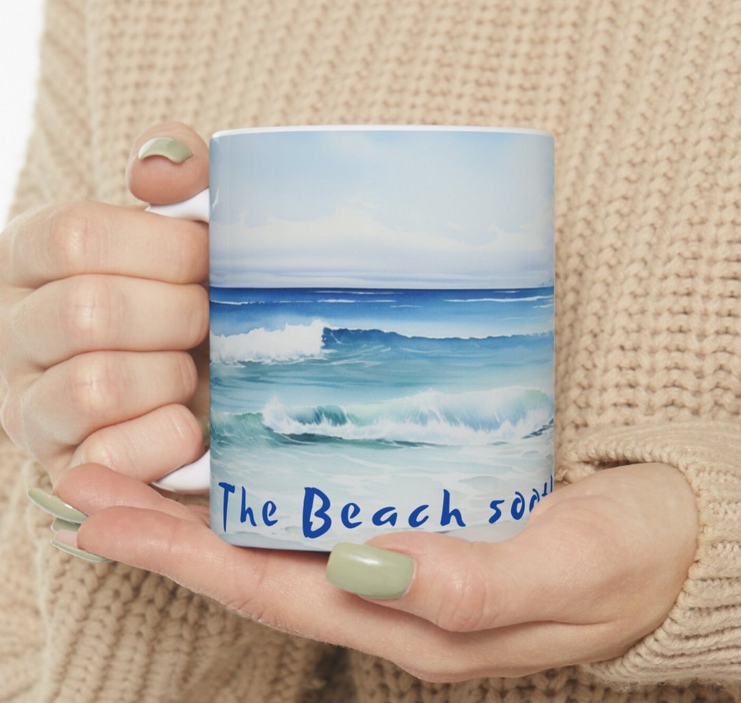 A Serene Beach Scene Where Gentle Waves Caress the Sandy Shore the