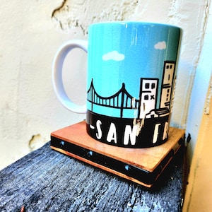 Hand Crafted Design San Francisco Skyline of iconic buildings and Golden Gate Bridge souvenir ceramic coffee mug