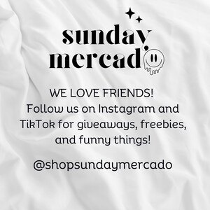 May include: Black and white text on a white background that reads "sunday mercado" with a smiley face graphic. The text below reads "WE LOVE FRIENDS! Follow us on Instagram and TikTok for giveaways, freebies, and funny things! @shopsundaymercado"