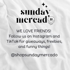 May include: Black and white text on a white background that reads "sunday mercado" with a smiley face graphic. The text below reads "WE LOVE FRIENDS! Follow us on Instagram and TikTok for giveaways, freebies, and funny things! @shopsundaymercado"