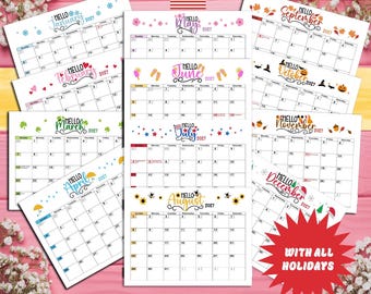 May include: A 2027 monthly planner calendar featuring twelve pages with seasonal illustrations for each month, including text labels for January through December, a US flag icon, and a red starburst graphic stating WITH ALL HOLIDAYS.