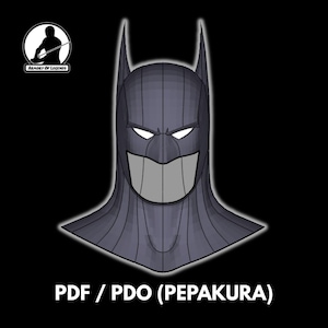 May include: A dark gray, pointed-ear cowl mask with white eye cutouts and a light gray mouth area. The graphic includes a circular logo with a silhouette and the text Armory Of Legends, with the text PDF / PDO (PEPAKURA) at the bottom.