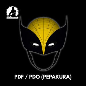 May include: A black and yellow Wolverine mask design, featuring a segmented yellow top and black eye and ear shapes. The text "PDF / PDO (PEPAKURA)" is at the bottom, with a logo in the upper left corner.