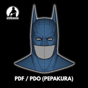 Könnte beinhalten: Eine blaue Batman-Maske mit spitzen Ohren und einem weit geöffneten Mund. Das Bild enthält den Text "PDF / PDO (PEPAKURA)" unten und ein Logo in der oberen linken Ecke. Die Maske ist ein 3D-Modell.