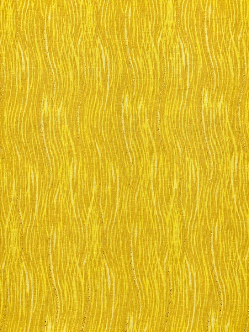 Joann yellow cotton by the yard glitter quilt