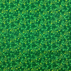 May include: Green shamrock pattern with the text "Lucky Pup" repeated throughout the design.