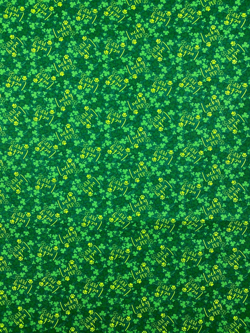 May include: Green shamrock pattern with the text "Lucky Pup" repeated throughout the design.