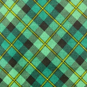 May include: A green and black plaid fabric with a yellow and white checkered pattern.