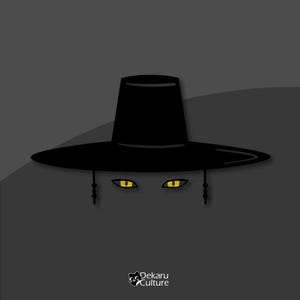 May include: A stylized illustration featuring a black hat with a wide brim and yellow eyes on a gray background. The hat has a cylindrical crown and is adorned with dangling black tassels. The image includes the text "Dekaru Culture" at the bottom.
