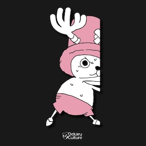 May include: A cartoon illustration of a character with a pink hat and shorts, peeking out from behind a black background. The character has white fur, a large eye, and a determined expression. The Dekaru Culture logo is in the bottom corner.
