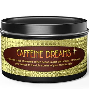 May include: A black metal tin with a gold label that reads "CAFFEINE DREAMS*" and "Combined notes of roasted coffee beans, sugar, and vanilla. It transports your senses to the rich aromas of your favorite cafe."