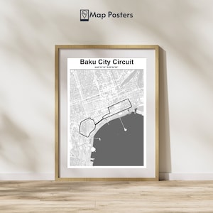 May include: A black and white map poster of the Baku City Circuit race track in Azerbaijan. The map shows the track layout and surrounding city streets. The title "Baku City Circuit" and coordinates "N40°22'16" E49°50'36" are printed at the top of the poster.