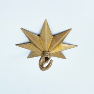 Brass Star Hook For Hanging Planters, Wind Chimes, Swag Pendent Lights and Keys - Decorative Open Hook For Home Ceiling & Wall Decor - Image showing star hook mounted on ceiling - AmandaHardware.etsy.com