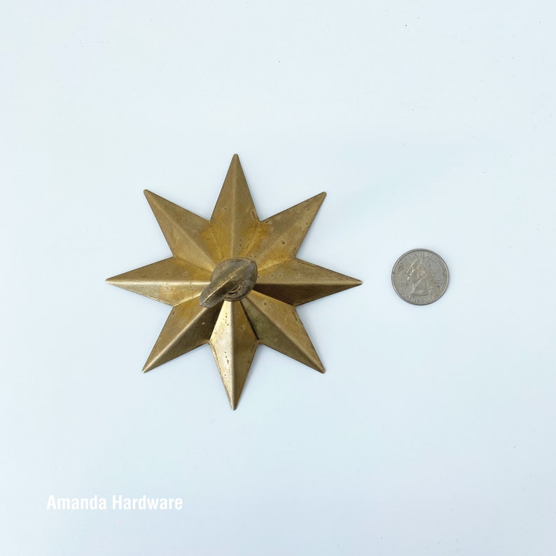 Brass Star Hook For Hanging Planters, Wind Chimes, Swag Pendent Lights and Keys - Decorative Open Hook For Home Ceiling & Wall Decor - Image showing star hook next to quarter for size comparison - AmandaHardware.etsy.com