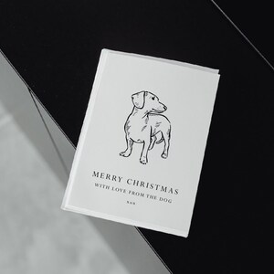 Christmas card with line drawn dog on the front