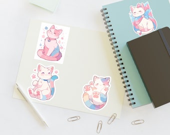 May include: Four colorful cat stickers with pink, blue, and white fur. The cats are in different poses, including sitting, lying down, and curled up. The stickers are perfect for adding a touch of whimsy to laptops, water bottles, or journals.