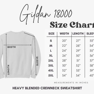 May include: Size chart for Gildan 18000 Heavy Blended Crewneck Sweatshirt. The chart shows measurements in inches for width, length, and sleeve length for sizes S through 5XL.