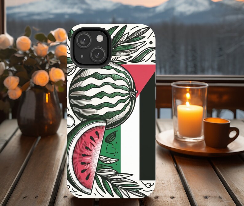 May include: A white phone case with a green, white, and red watermelon design. The case has a black camera lens cutout and a white background.
