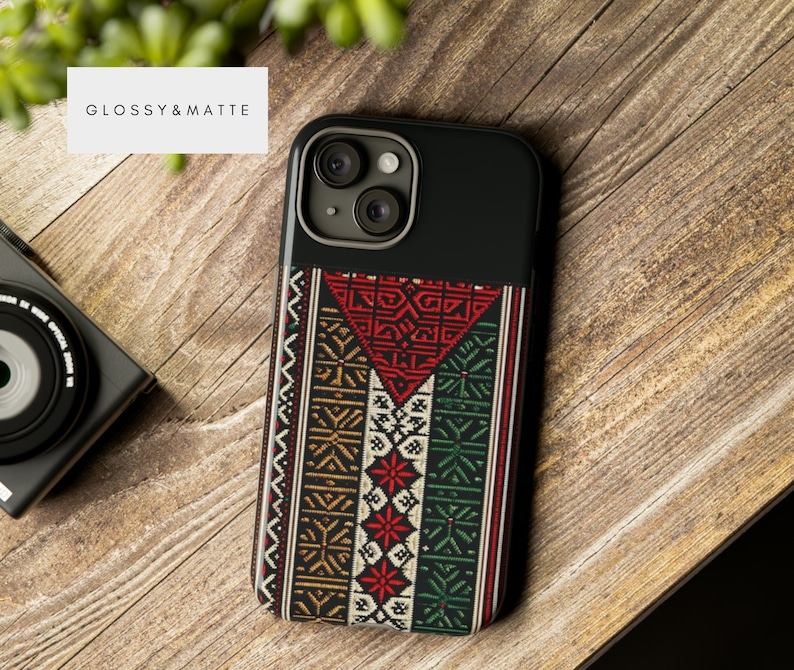 May include: A black phone case with a colorful geometric pattern. The case has a glossy finish and a matte pattern. The text "GLOSSY & MATTE" is printed on the top of the case.