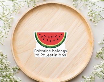 May include: A sticker with a watermelon slice graphic and the text "Palestine belongs to Palestinians".