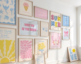 May include: A collection of framed art prints with a summer theme. The prints feature various designs, including an ice cream cone, a butterfly, flowers, and the words "SUMMER" and "LOVE". The color palette includes pink, yellow, and blue.