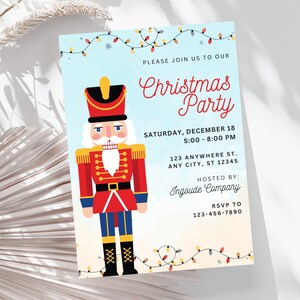 May include: A Christmas party invitation card featuring a colorful nutcracker illustration on a light blue background with string lights. The text reads: PLEASE JOIN US TO OUR Christmas Party SATURDAY, DECEMBER 18 5:00 - 8:00 PM 123 ANYWHERE ST. ANY CITY, ST 12345 HOSTED BY: Ingoude Company RSVP TO 123-456-7890.