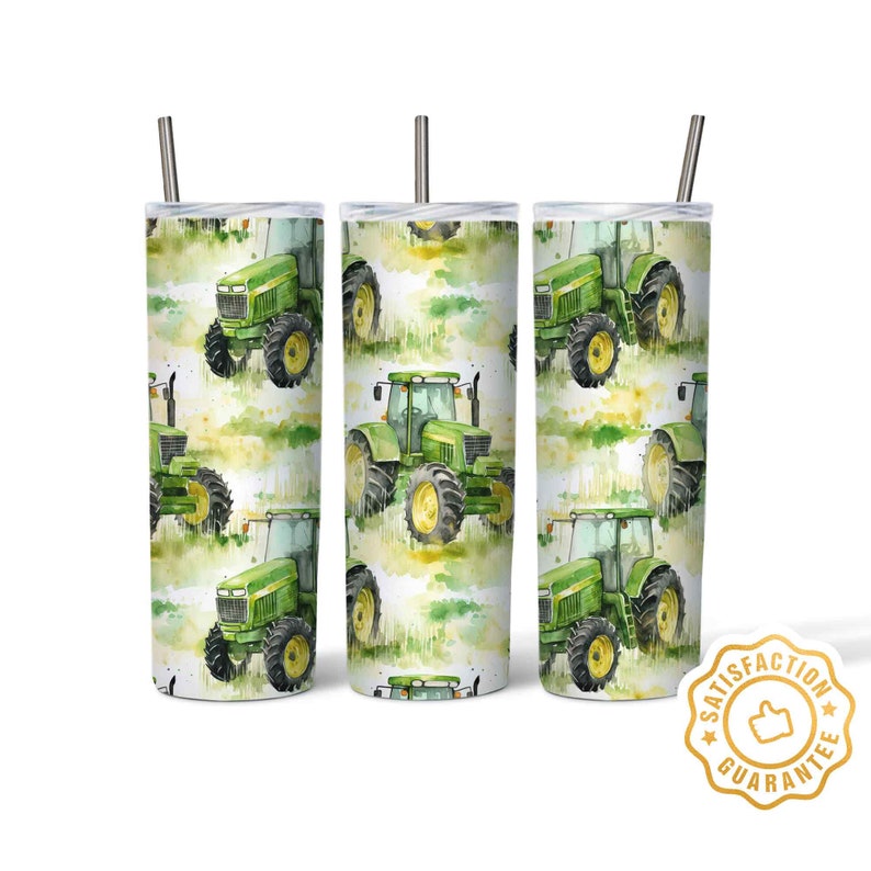 May include: Three stainless steel tumblers featuring a green tractor pattern. The tumblers have a white background with green, yellow, and brown watercolour accents. The tractors are green and black with brown wheels. The tumblers come with a straw.
