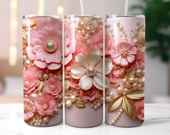 May include: Three pink and gold tumblers with a floral design featuring pink flowers, pearls, and gold accents.