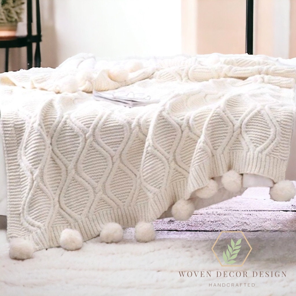Cream pom pom throw blanket hotsell