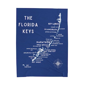 May include: A blue map of the Florida Keys with the names of the islands and the text "The Florida Keys" at the top.