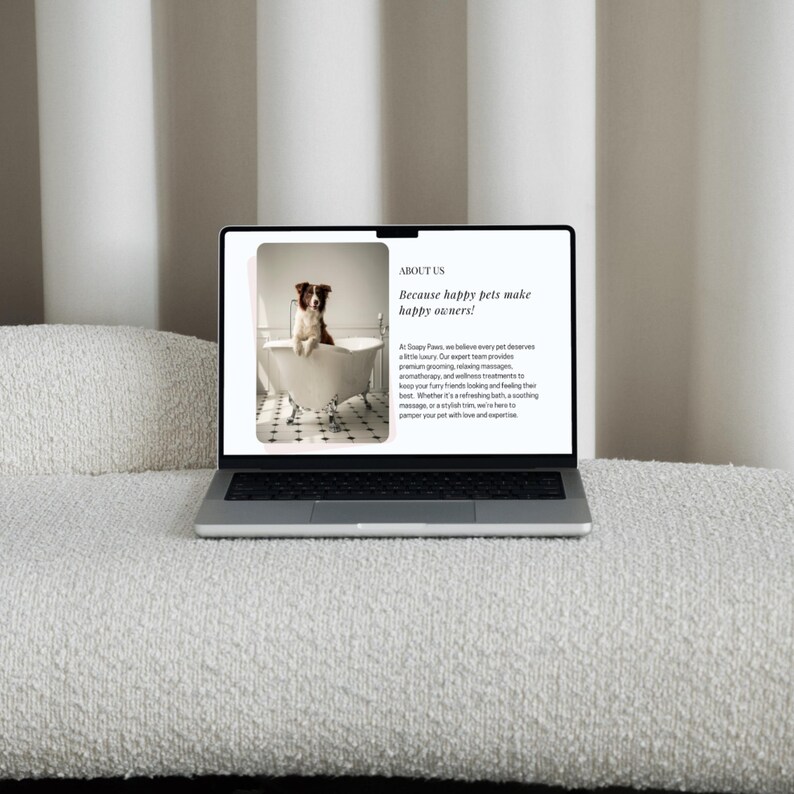 May include: A laptop computer displaying a website for a pet grooming service. The website features a photo of a dog in a bathtub and the text "Because happy pets make happy owners!"