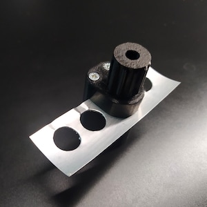 Nr. 11 doppenmaker met extra pons