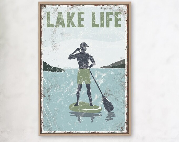 vintage "LAKE LIFE" sign , green accent > paddleboarding poster for vintage lake house decor, male paddle boarder, modern FARMHOUSE, Canvas
