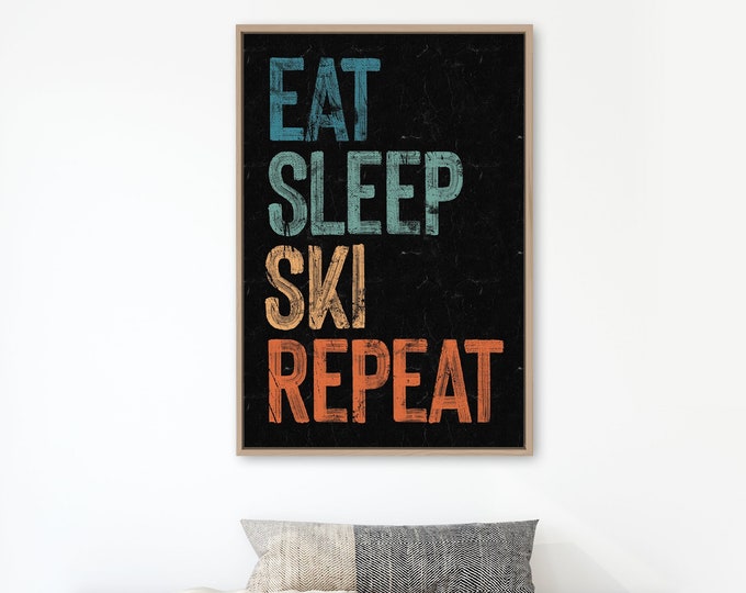 Eat Sleep Ski Repeat sign on black, retro beach house canvas prints, vacation rental art, fun ski signs, vintage winter decor & wall art