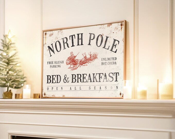 Hot Cocoa Print, North Pole Bed and Breakfast Sign with a Flying Sleigh on Weathered Cream
