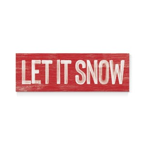 Full view of the barn red "Let It Snow" sign with weathered white lettering on a plain background.