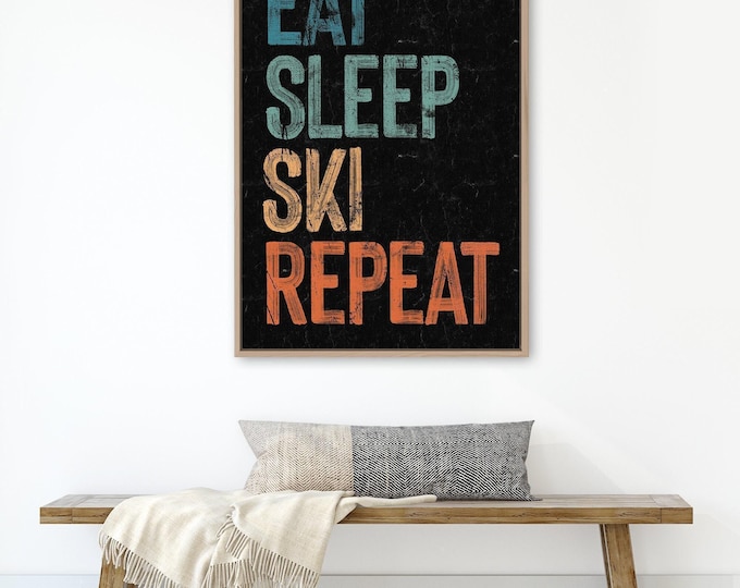 Eat Sleep Ski Repeat sign on black, retro beach house canvas prints, vacation rental art, fun ski signs, vintage winter decor & wall art