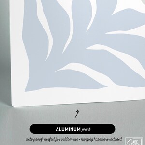 An aluminum option card for the dusty blue sea creature set, with the lower half of the design up close above a label.