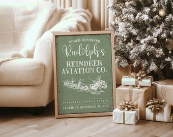 Vintage santa and reindeer sign, flying sleigh art on a sage green ground