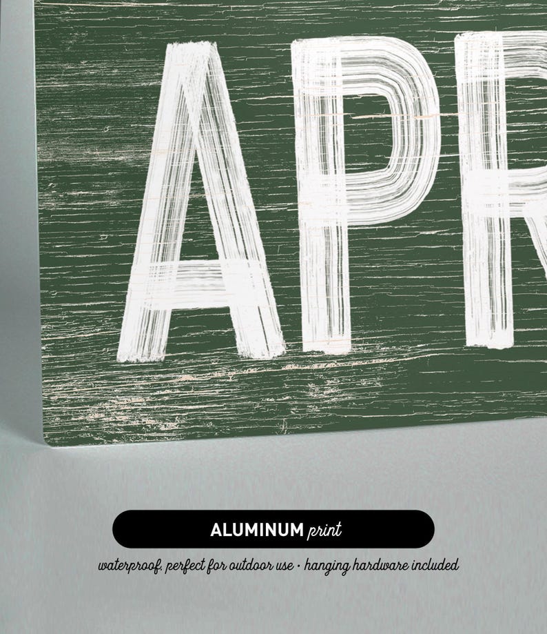 a wooden sign with the word apr written on it