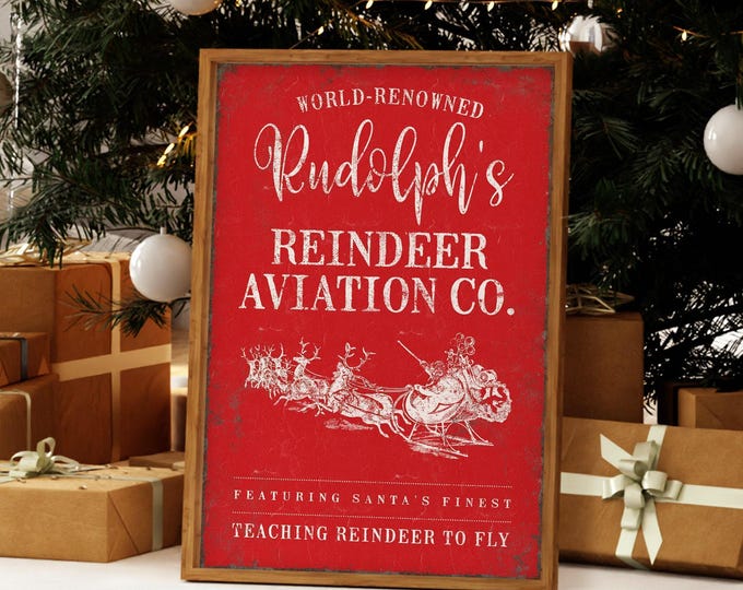 Red Reindeer Art, Rudolph's Aviation Co Sign with Santa's Flying Sleigh in Cream White