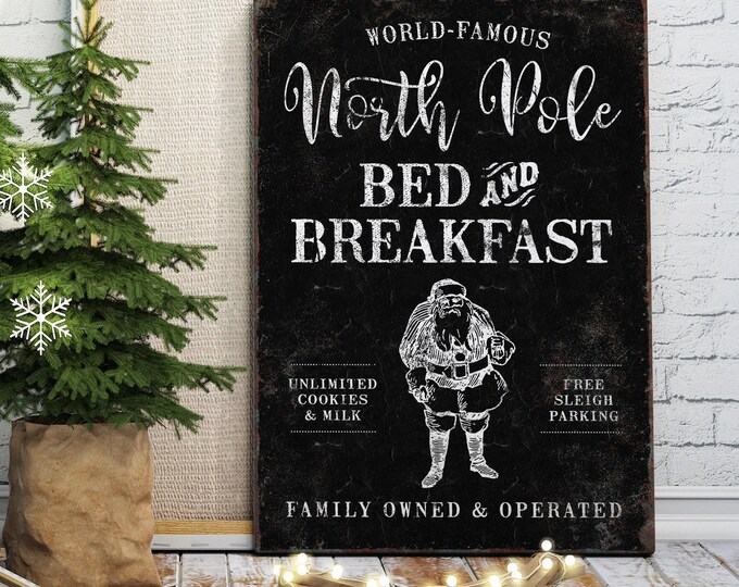 North Pole Bed and Breakfast Retro Santa Artwork in White on Black