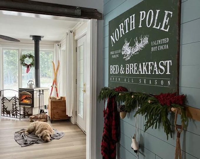 Green Sleigh Sign, North Pole Bed and Breakfast with a Cream Reindeer Team and Hot Cocoa