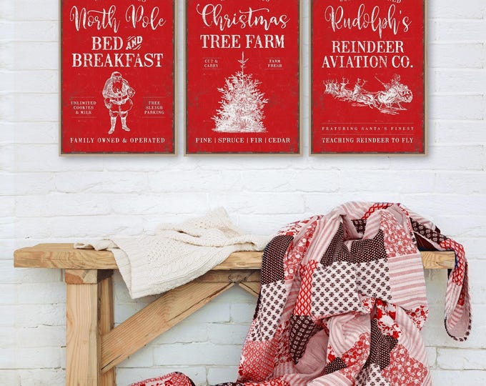 Red Reindeer Sign, Three North Pole Panels with Santa, a Tree and Sleigh on Cream White