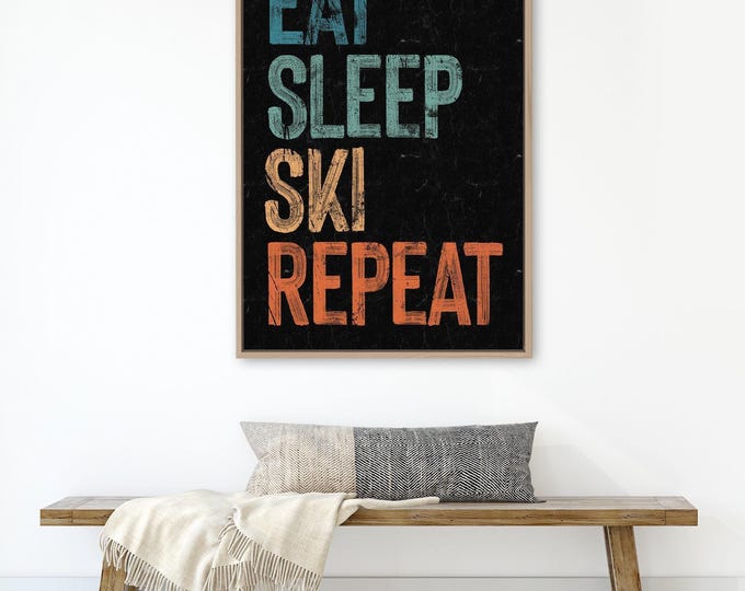 Eat Sleep Ski Repeat sign on black, retro beach house canvas prints, vacation rental art, fun ski signs, vintage winter decor & wall art