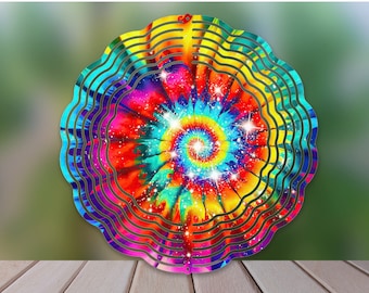 May include: A colorful tie-dye wind spinner with a spiral design and glitter accents. The wind spinner has multiple layers and is made of metal.