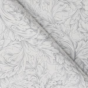 May include: White wallpaper with a gray, stylized leaf pattern. The leaves have intricate details and are arranged in a repeating design. The wallpaper is folded, showing the texture and layers of the material.