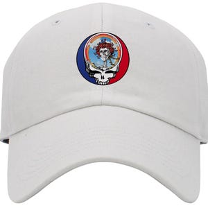 May include: White baseball cap with a colorful Grateful Dead Steal Your Face logo embroidered on the front.