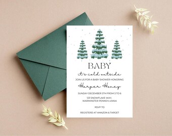 May include: A white rectangular baby shower invitation card featuring three green pine trees with snow, and the text: BABY it's cold outside, JOIN US FOR A BABY SHOWER HONORING Harper Honey, SUNDAY DECEMBER 5TH FROM 3 TO 6, 123 SNOWFLAKE WAY, WARMINSTER PENNSYLVANIA, RSVP TO REGISTER AT AMAZON & TARGET.
